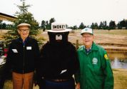 Dick Henderson and Chet Nolte with Smokey Bear at Evergreen Earth Day.